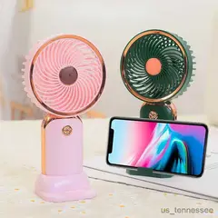 GENERICO - VENTILADOR MINI DE MANO RECARGABLE SOPORTE BASE A CELULAR COLORES
