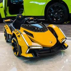 OEM - Carro Eléctrico coche Deportivo Amarillo Estilo Lamborguini V12 Vision Gran Turismo 6V 380 Motor