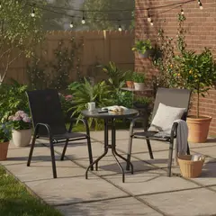 JUST HOME COLLECTION - Mesa de Terraza Metal con Vidrio Redonda Negro 60 CM + Silla para Terraza Sling Negro 91x55x74 cm