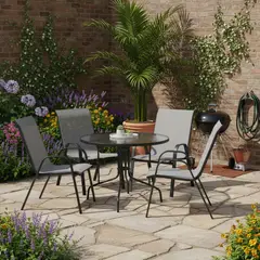 JUST HOME COLLECTION - Juego de comedor mesa redonda de Vidrio 120x70x120 + 4 sillas de metal Sling Crudo